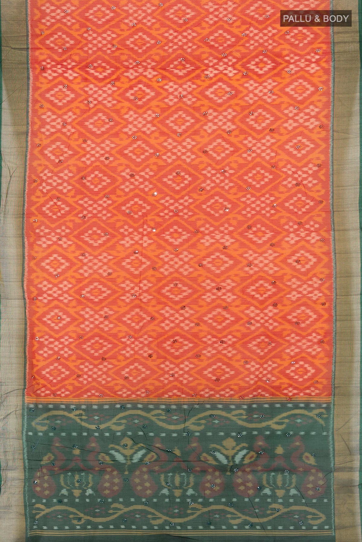 Flat view of Orange Silk Cotton Saree with Ikat Print on the body and Zari Border. 