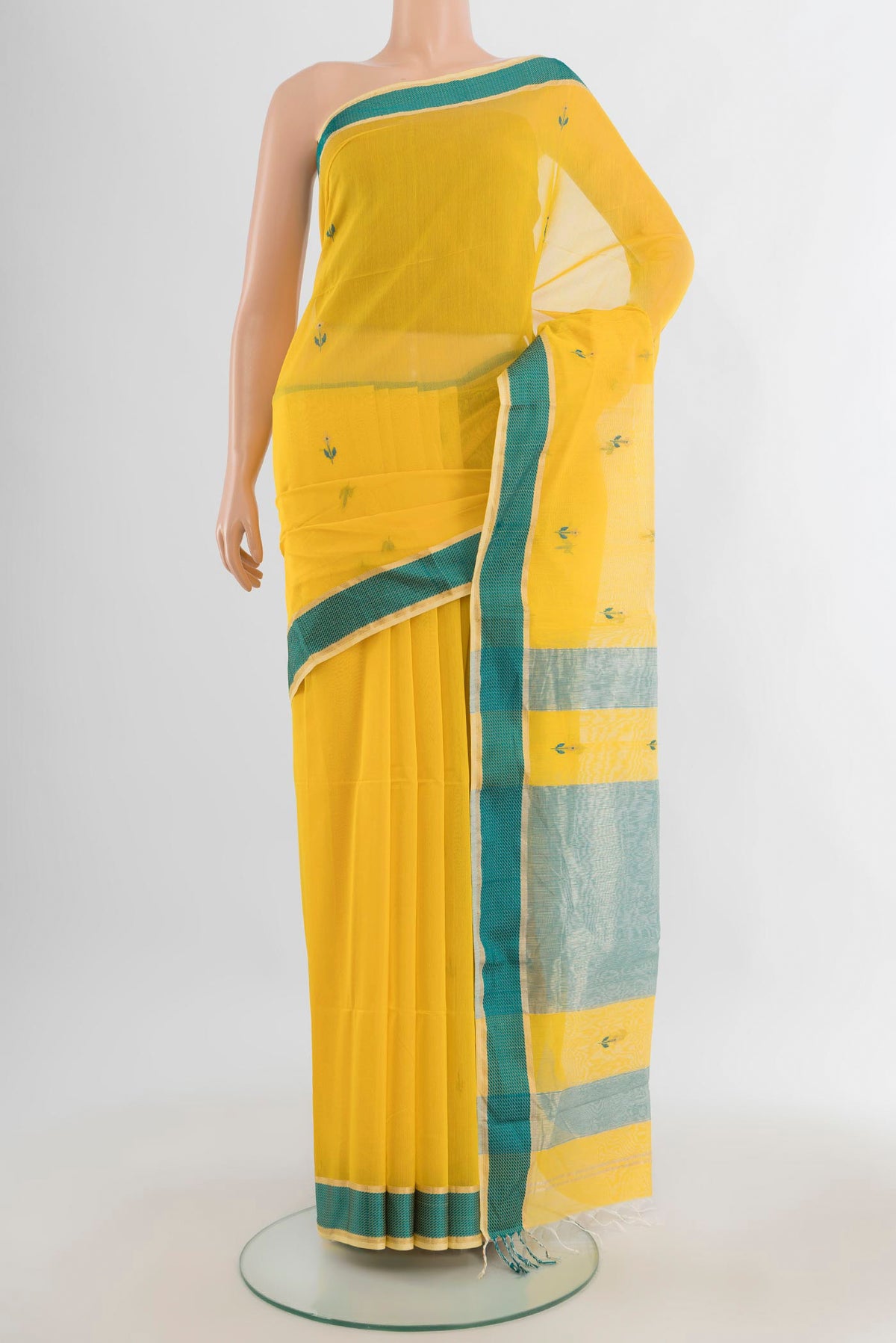 Yellow Maheshwari Cotton Saree with Thread Butta on the body and Thread Border.  displayed on a mannequin