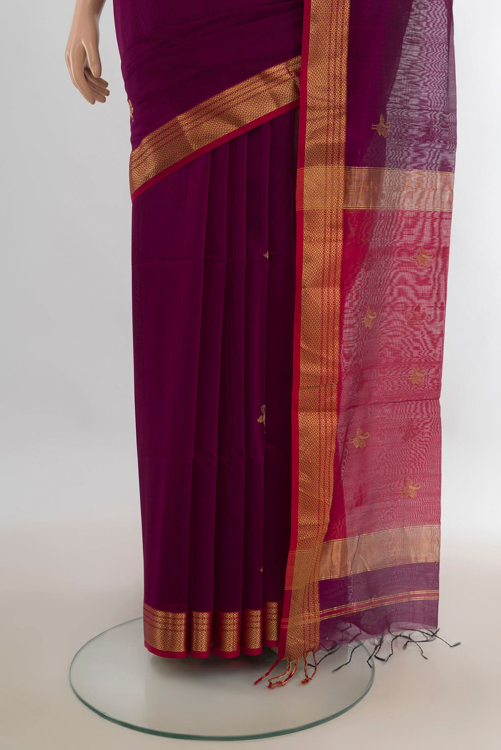 Pleats and pallu of Purple Maheshwari Cotton Saree with Zari Butta on the body and Zari Border. 