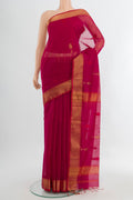Dark Pink Maheshwari Silk Cotton Saree with Zari Butta on the body and Silk Border.  displayed on a mannequin