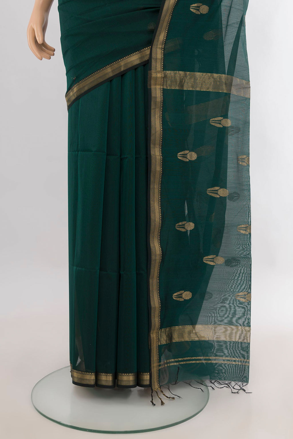 Pleats and pallu of Bottle Green Maheshwari Cotton Saree with Zari Butta on the body and Zari Border. 