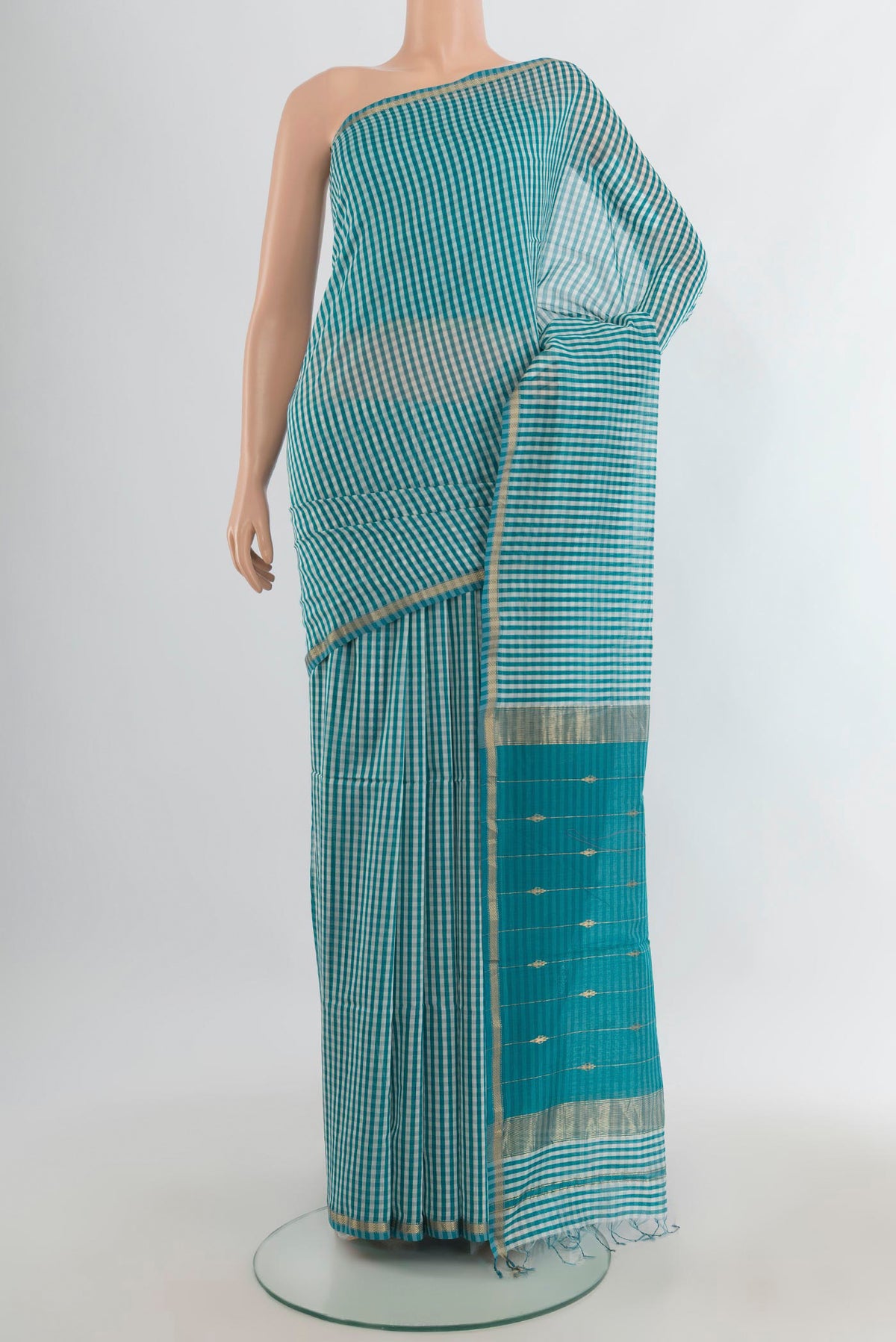 Multi Color Maheshwari Cotton Saree with Checked design on the body and Zari Border.  displayed on a mannequin