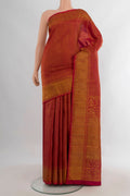 Pure Silk Red Kanjivaram Saree with Zari Brocade on the body and Zari Border.  displayed on a mannequin