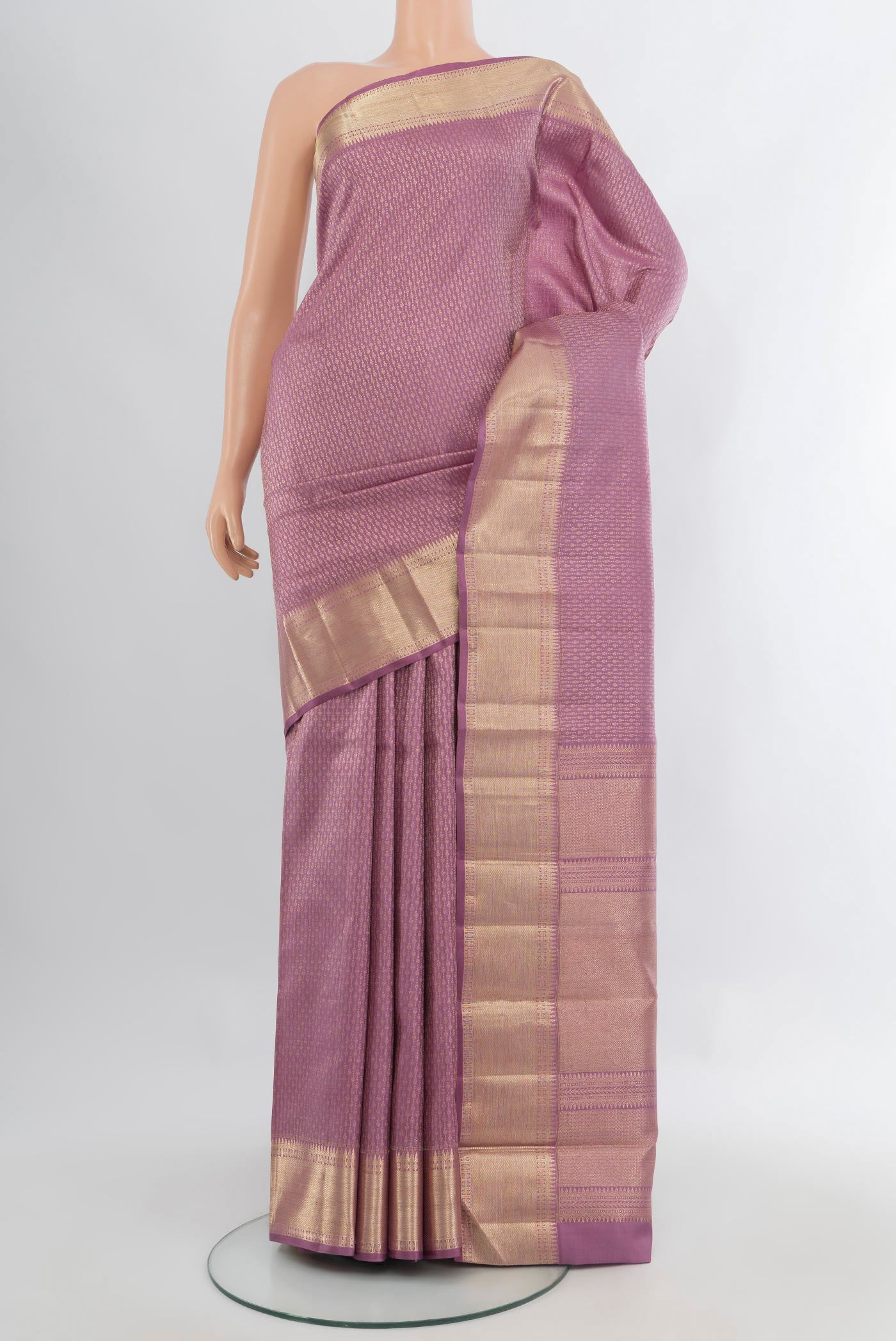 Pure Silk Pure Zari Lavender Kanjivaram Saree with Zari Butta on the body and Zari Border.  displayed on a mannequin