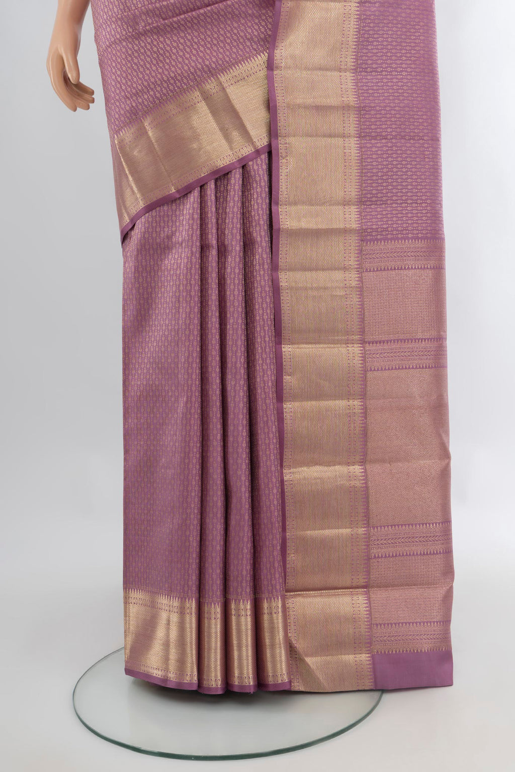 Pleats and pallu of Pure Silk Pure Zari Lavender Kanjivaram Saree with Zari Butta on the body and Zari Border. 