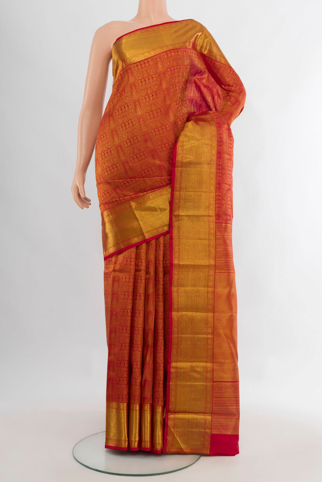Pure Silk Maroon Kanjivaram Saree with Zari Brocade on the body and Zari Border.  displayed on a mannequin