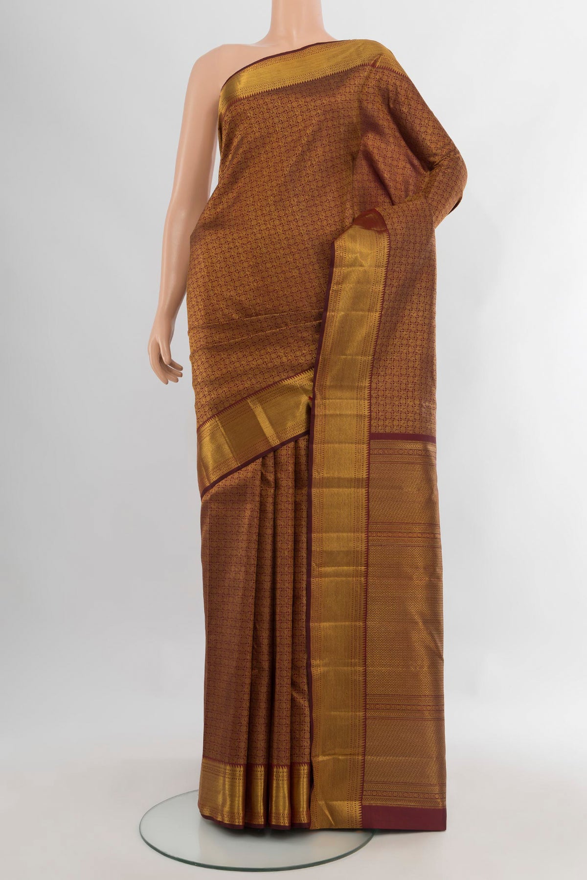 Pure Silk Pure Zari Coffee Brown Kanjivaram Saree with Zari Brocade on the body and Zari Border.  displayed on a mannequin