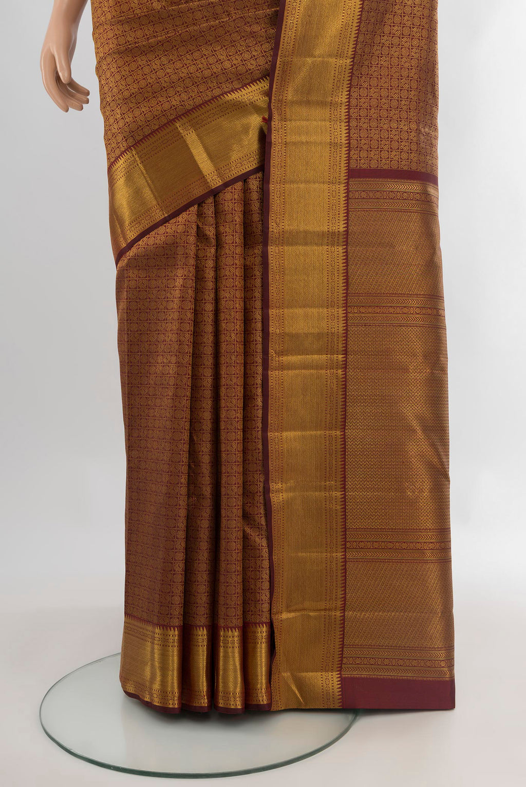 Pleats and pallu of Pure Silk Pure Zari Coffee Brown Kanjivaram Saree with Zari Brocade on the body and Zari Border. 