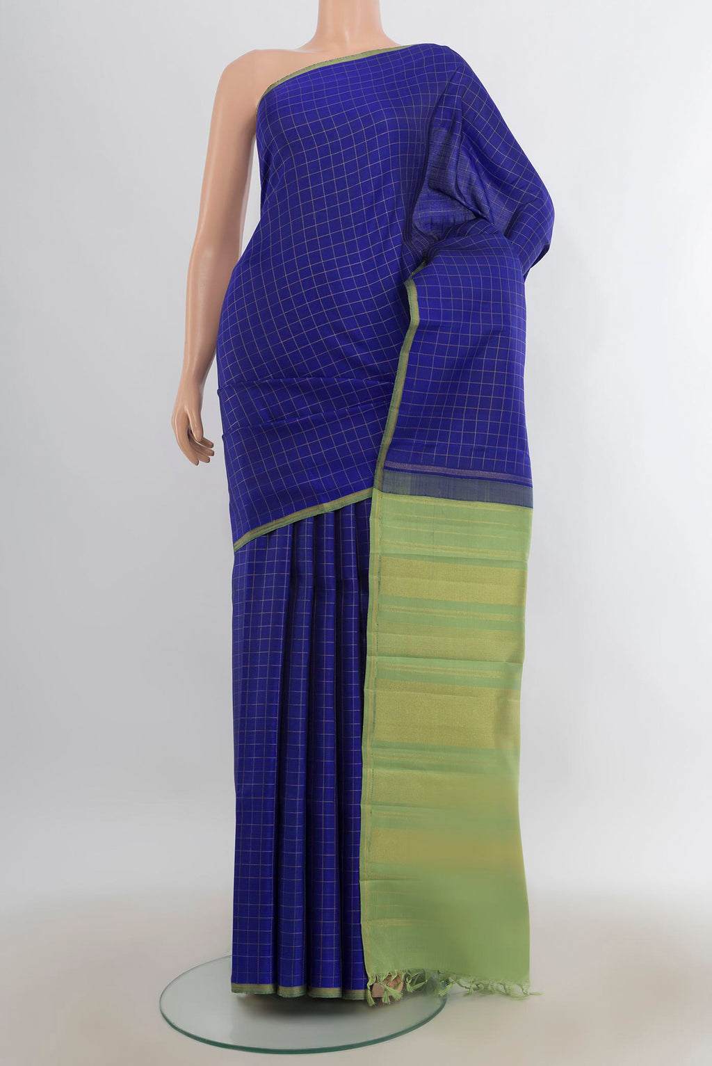 Pure Silk Pure Zari Royal Blue Kanchipuram Saree with Checked design on the body and Without Border.  displayed on a mannequin