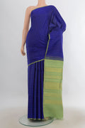 Pure Silk Pure Zari Royal Blue Kanchipuram Saree with Checked design on the body and Without Border.  displayed on a mannequin