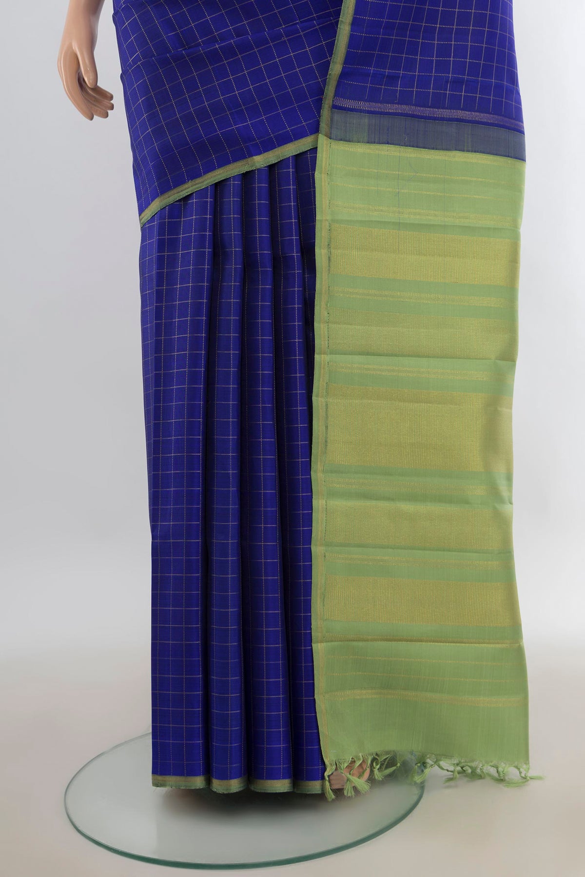 Pleats and pallu of Pure Silk Pure Zari Royal Blue Kanchipuram Saree with Checked design on the body and Without Border. 