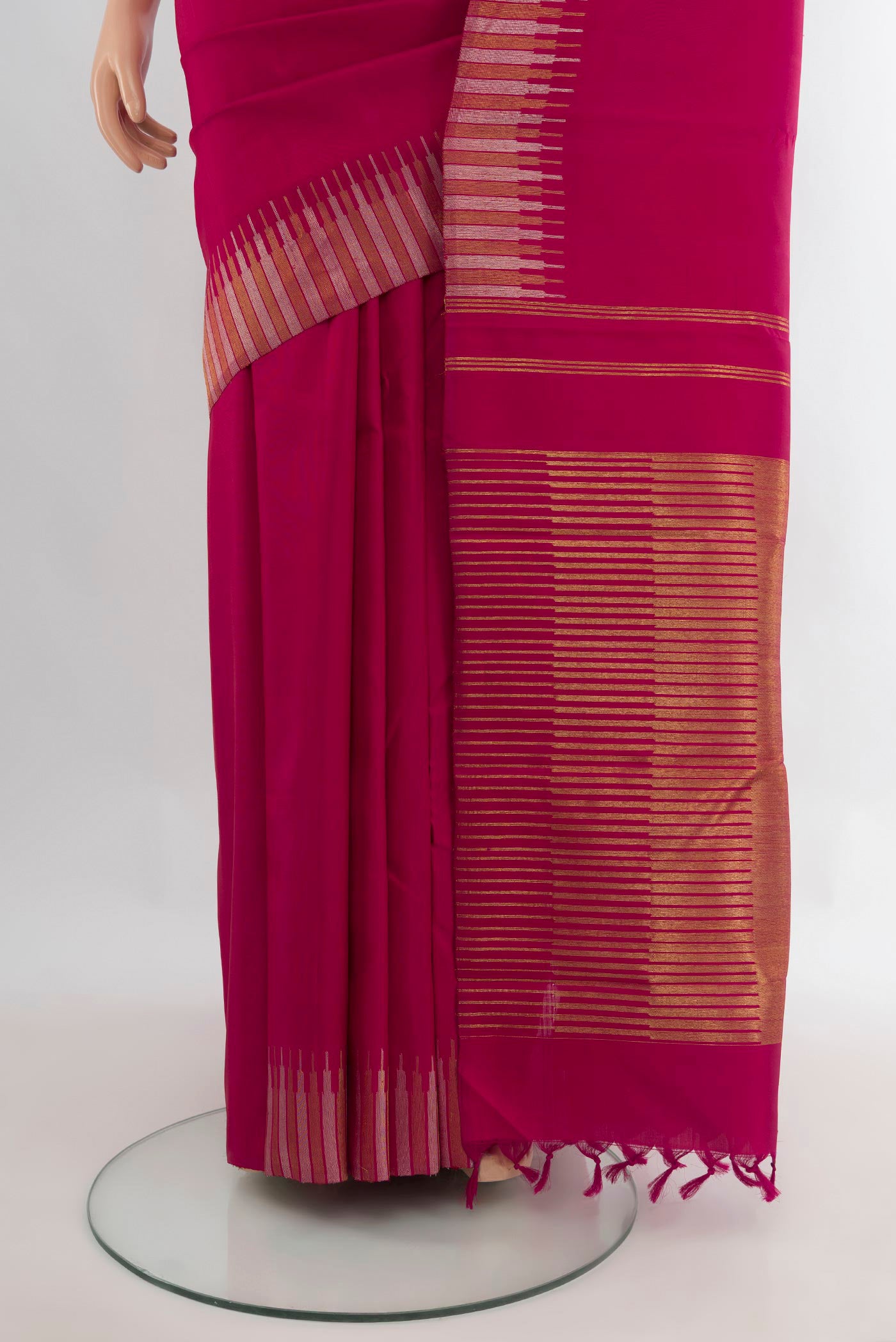 Pleats and pallu of Pure Silk Pure Zari Maroon Kanchipuram Saree with Plain Body and Temple Border. 