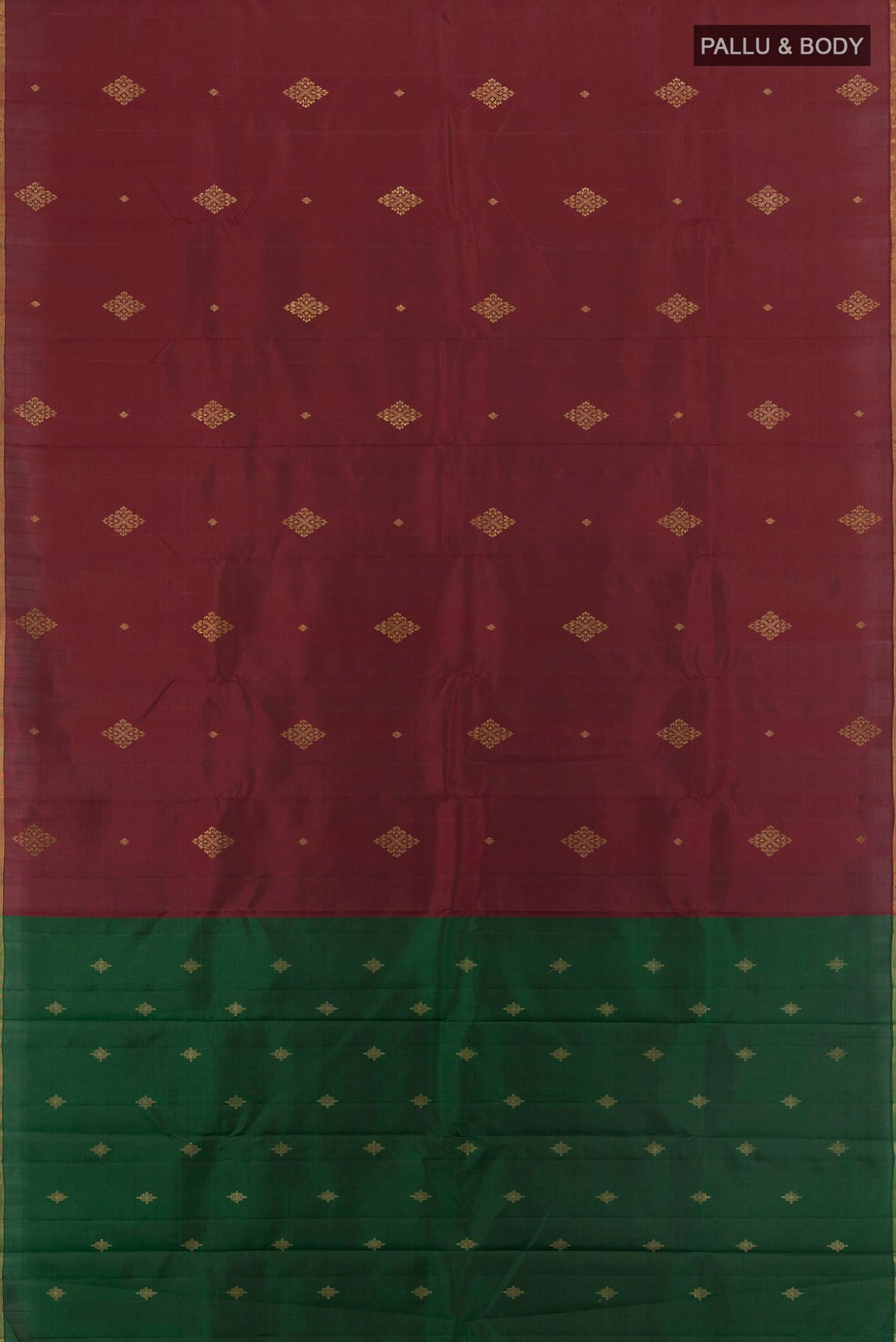 Flat view of Pure Silk Pure Zari Maroon Kanchipuram Saree with Zari Butta on the body and Zari Border. 