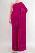 Magenta Kanjivaram Silk Saree with Checked design on the body and Plain Border.  displayed on a mannequin