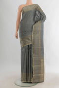 Pure Silk Davys Grey Kanjivaram Saree with Stripes on the body and Zari Border.  displayed on a mannequin
