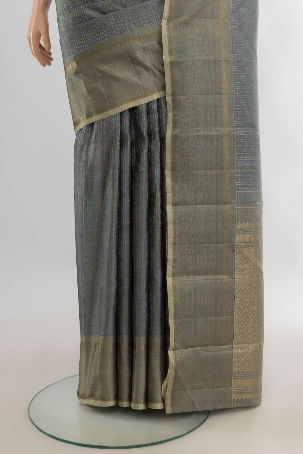 Pleats and pallu of Pure Silk Davys Grey Kanjivaram Saree with Stripes on the body and Zari Border. 