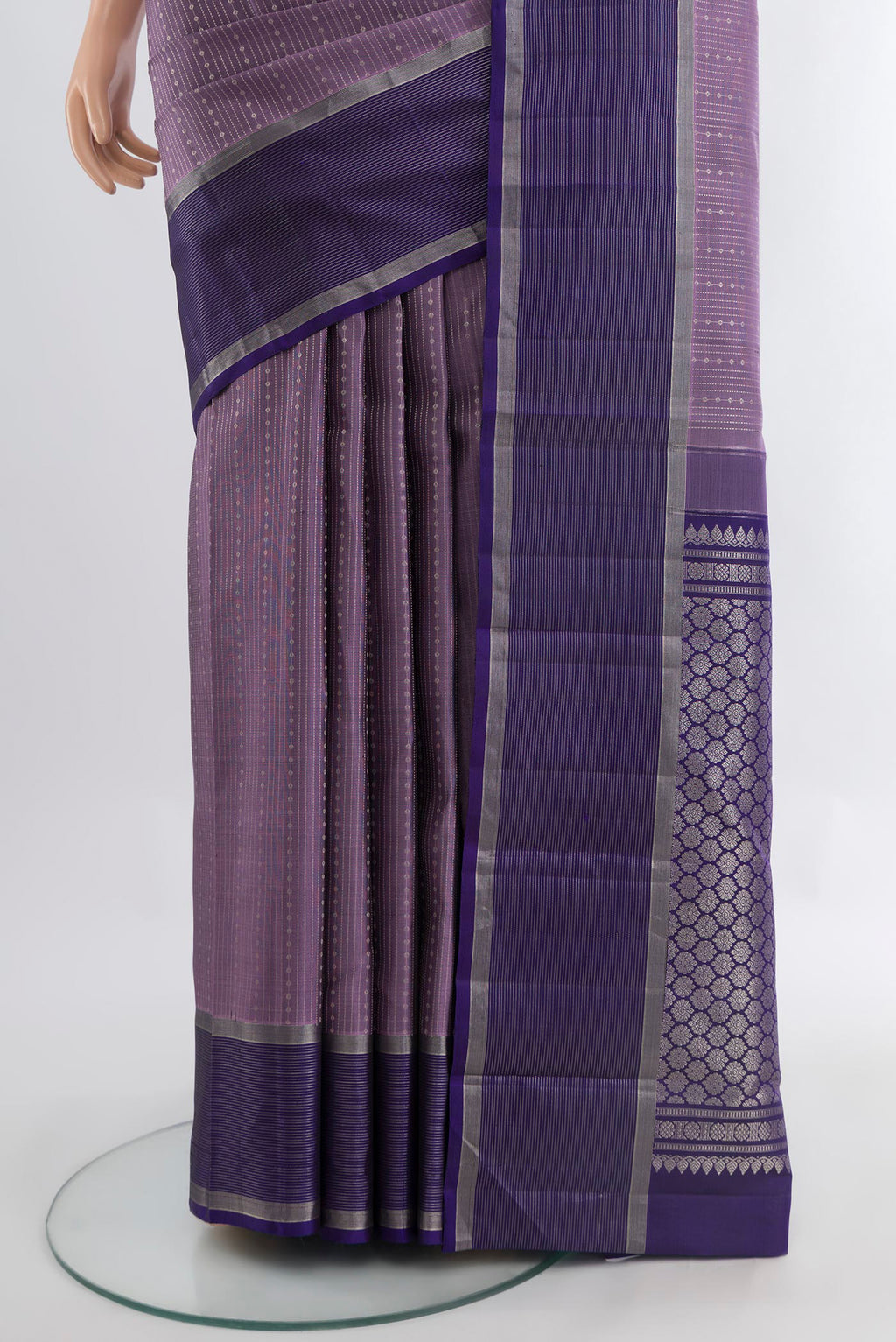 Pleats and pallu of Pure Silk Pure Zari Lavender Kanjivaram Saree with Zari Butta on the body and Silk Border. 