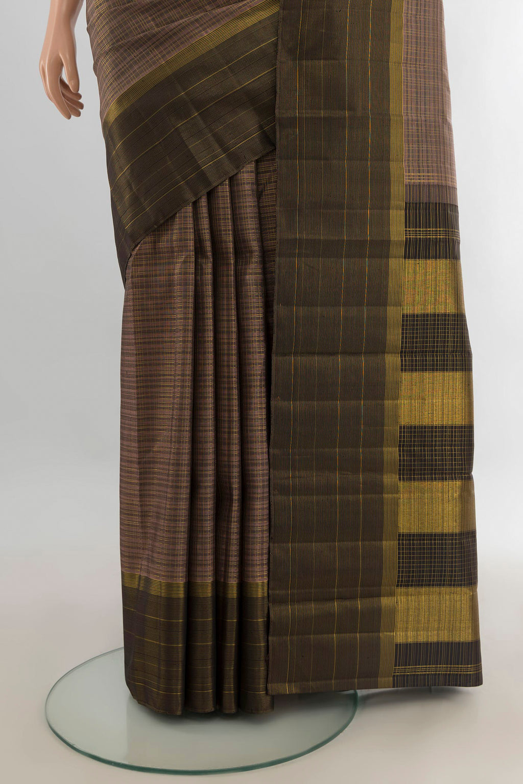Pleats and pallu of Pure Silk Brown Kanjivaram Saree with Checked design on the body and Zari Border. 