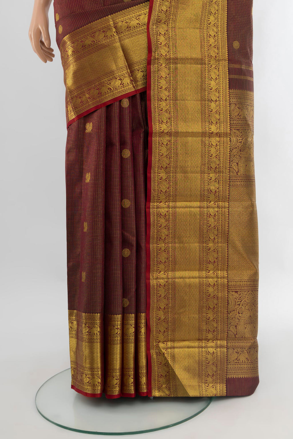 Pleats and pallu of Coffee Brown Kanchipuram Silk Saree with Zari Butta on the body and Zari Border. 