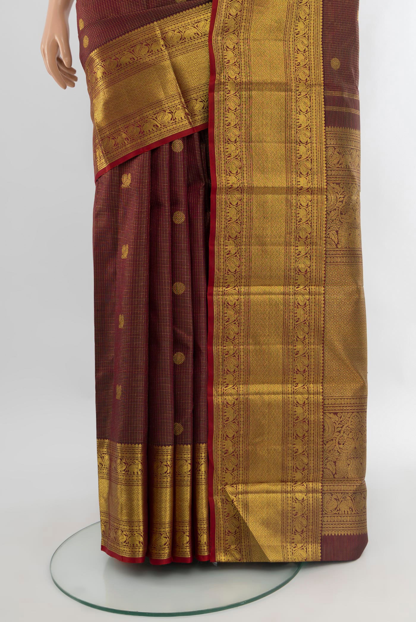 Pleats and pallu of Coffee Brown Kanchipuram Silk Saree with Zari Butta on the body and Zari Border. 