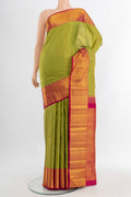 Pure Silk Pure Zari Light Green Kanchipuram Saree with Plain Body and Silk Border.  displayed on a mannequin