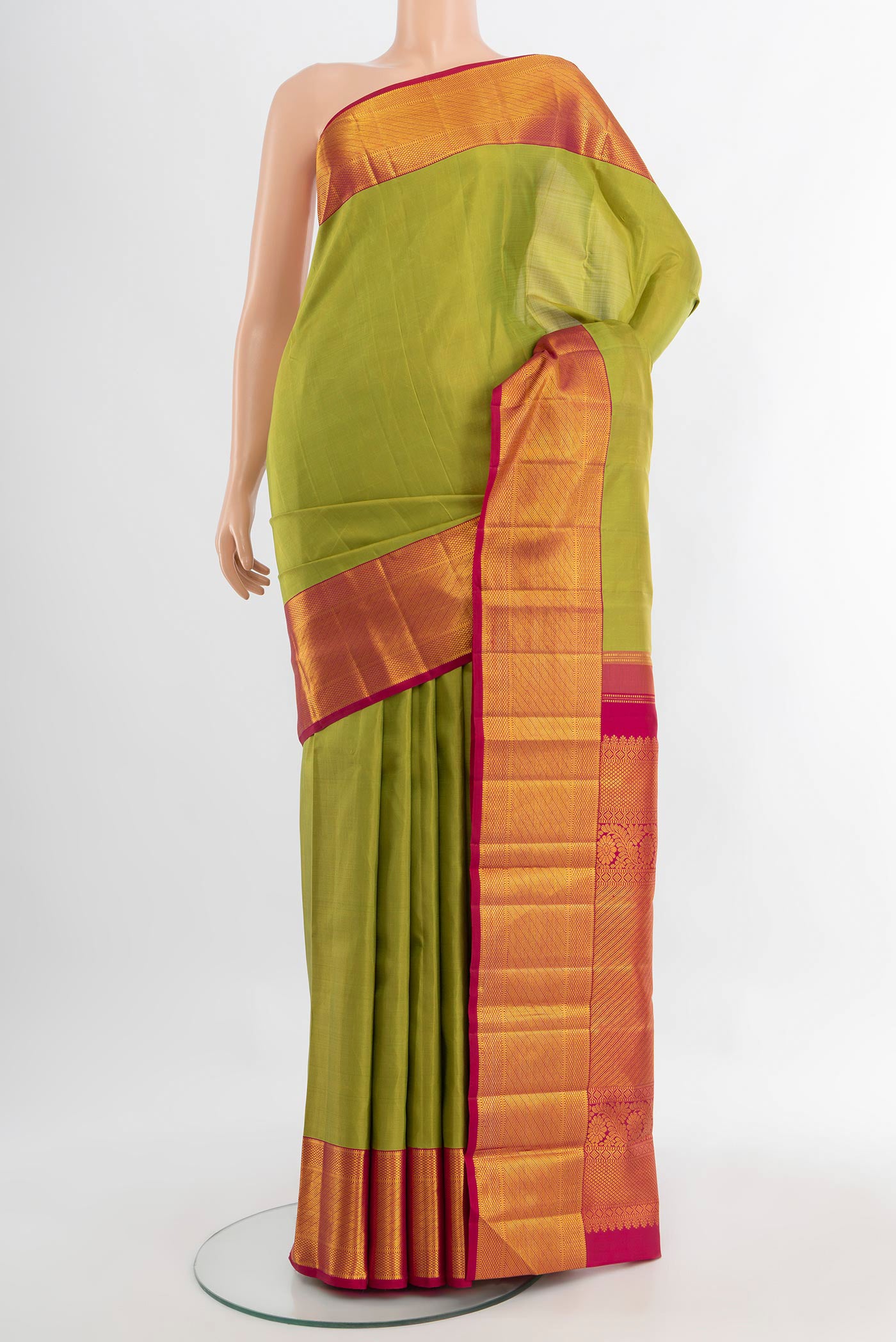 Pure Silk Pure Zari Light Green Kanchipuram Saree with Plain Body and Silk Border.  displayed on a mannequin