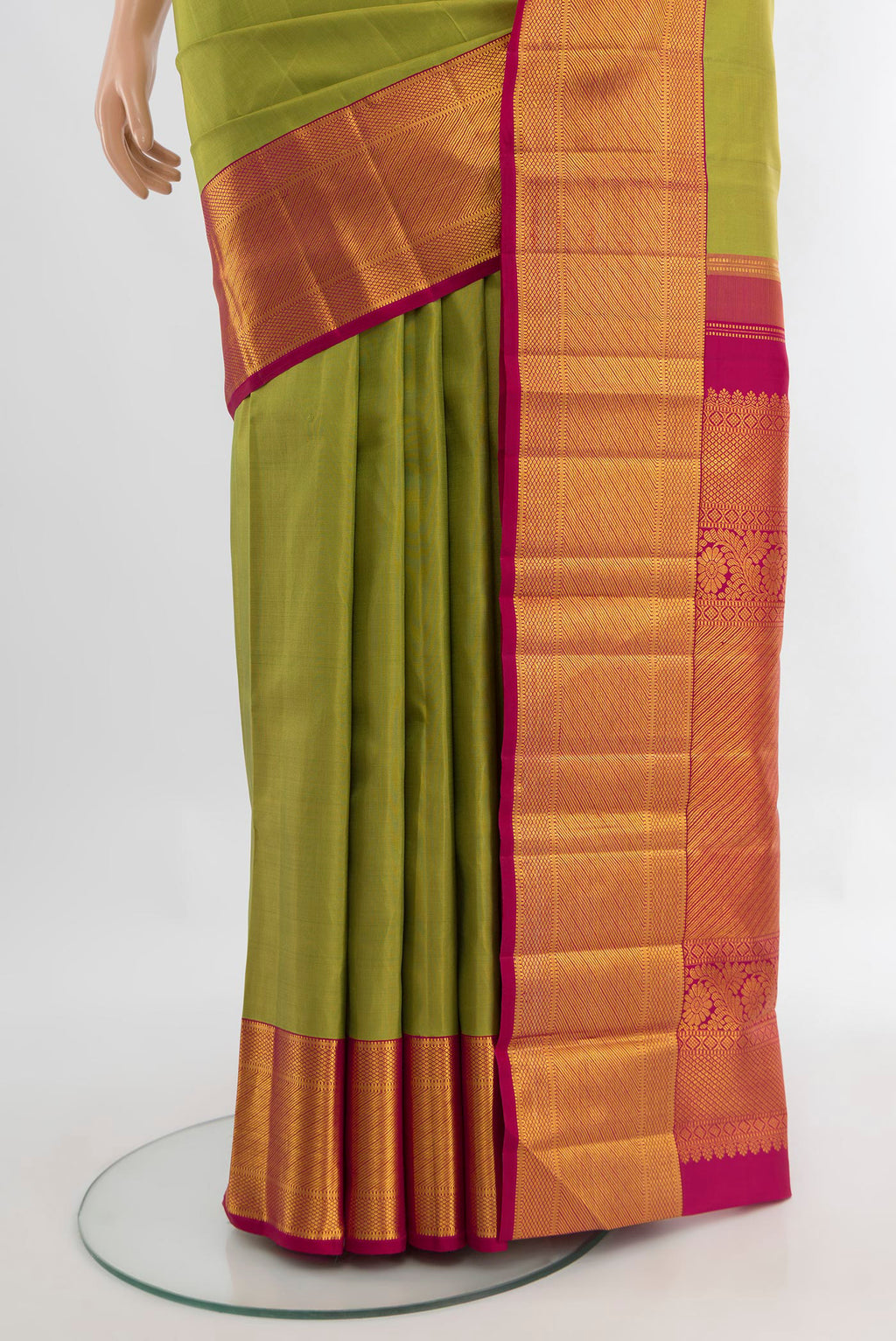 Pleats and pallu of Pure Silk Pure Zari Light Green Kanchipuram Saree with Plain Body and Silk Border. 