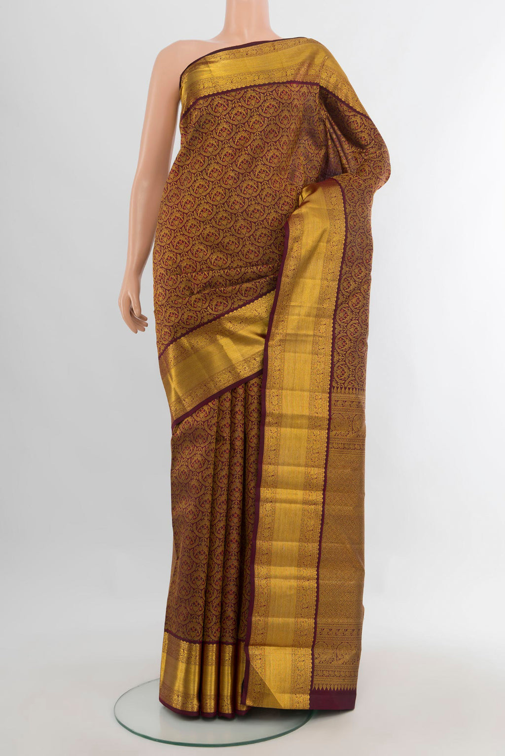 Pure Silk Coffee Brown Kanchipuram Saree with Zari Brocade on the body and Zari Border.  displayed on a mannequin