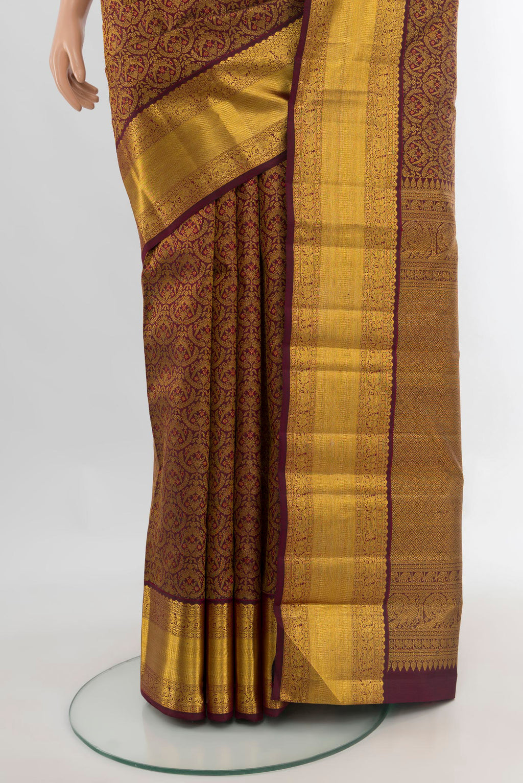 Pleats and pallu of Pure Silk Coffee Brown Kanchipuram Saree with Zari Brocade on the body and Zari Border. 
