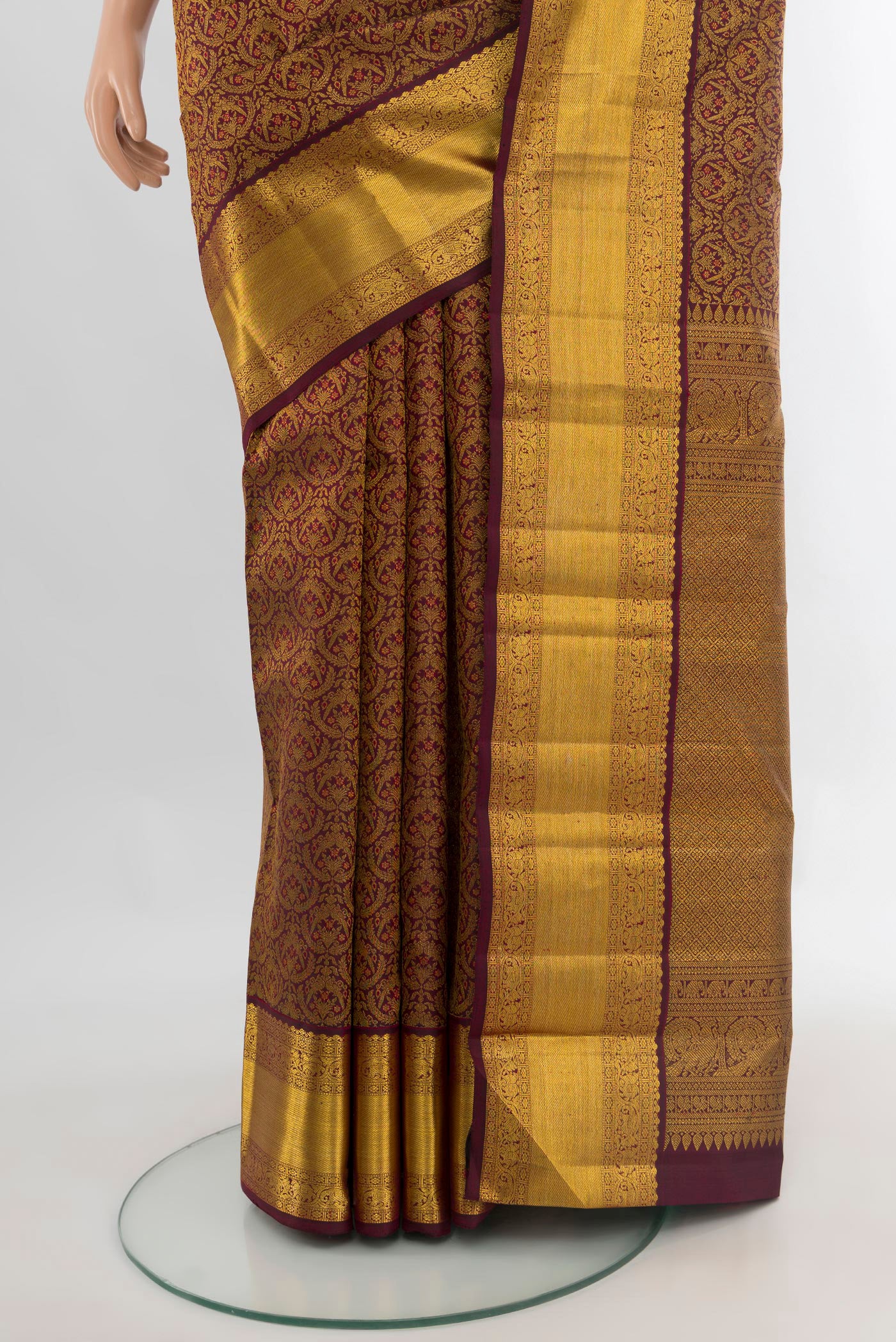 Pleats and pallu of Pure Silk Coffee Brown Kanchipuram Saree with Zari Brocade on the body and Zari Border. 