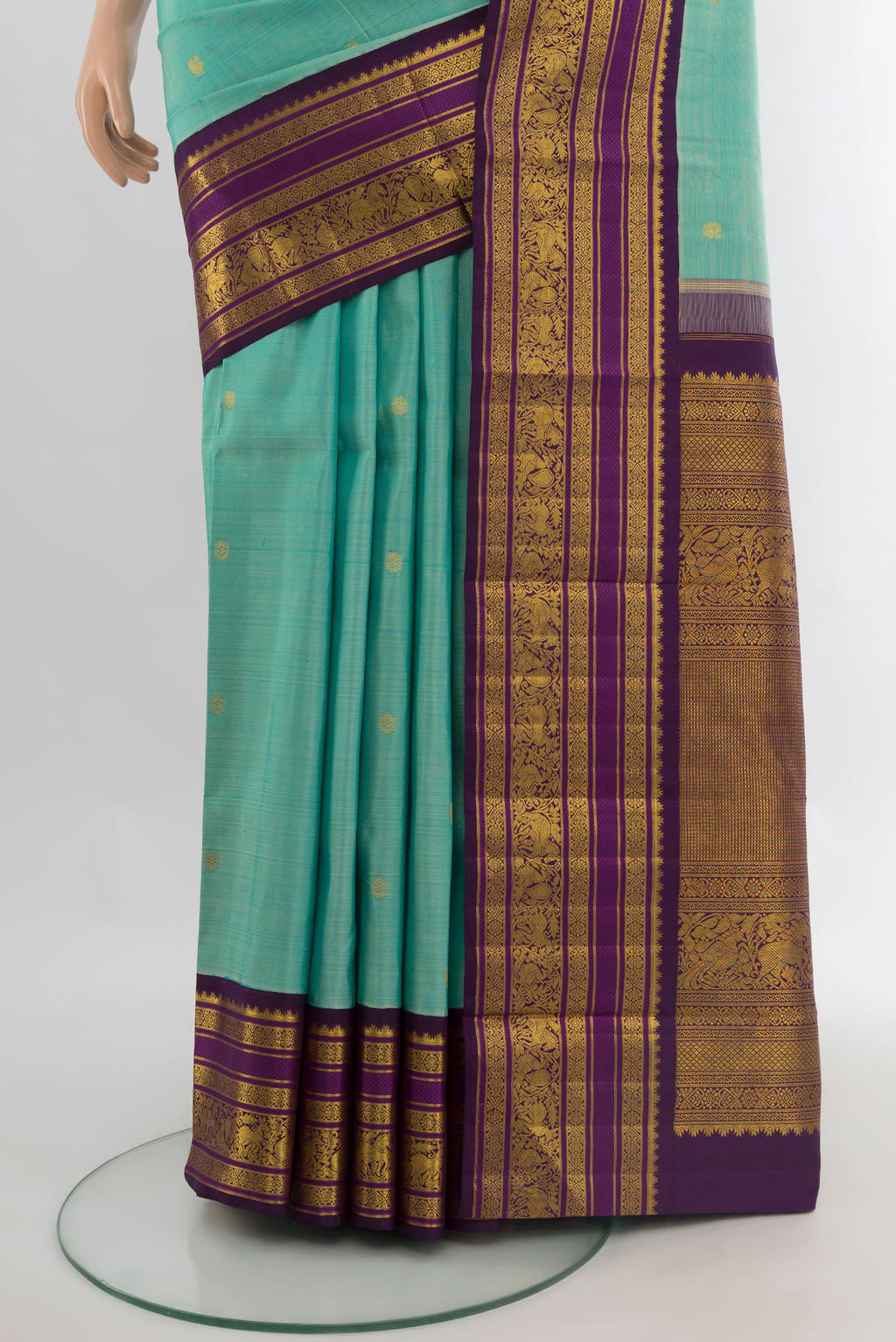 Pleats and pallu of Pure Silk Sky Blue Kanchipuram Saree with Zari Butta on the body and Zari Border. 