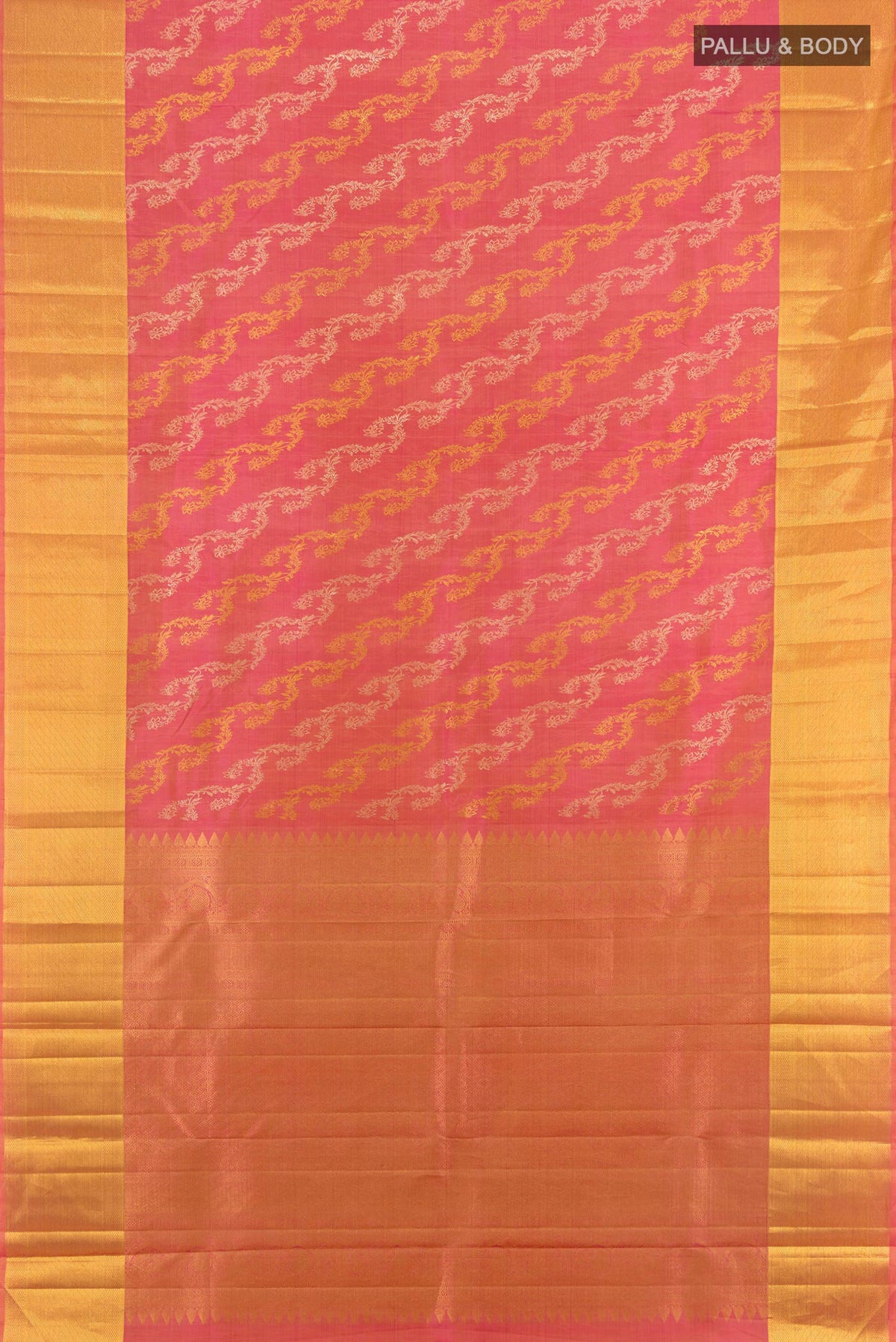 Flat view of Pure Silk Coral Kanchipuram Saree with Zari Brocade on the body and Zari Border. 