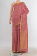 Pure Silk Rose Gold Kanjivaram Saree with Zari Butta on the body and Silk Border.  displayed on a mannequin