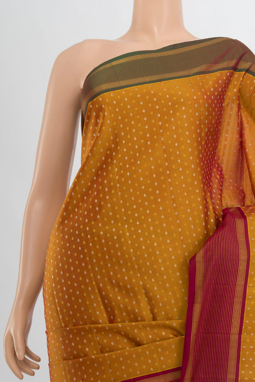 Border image of Pure Silk Mustard Kanjivaram Saree with Zari Butta on the body and Silk Border. 