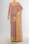 Pure Silk Peach Kanchipuram Saree with Jacquard design on the body and Zari Border.  displayed on a mannequin