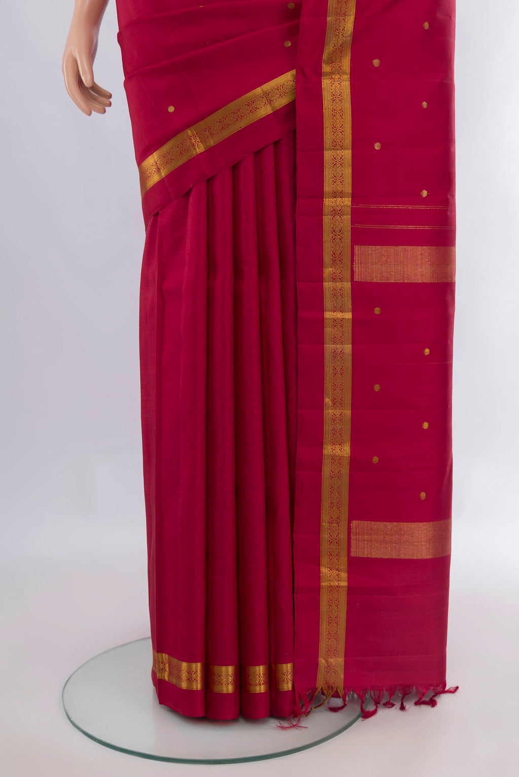 Pleats and pallu of Pure Silk Red Kanjivaram Saree with Zari Butta on the body and Zari Border. 