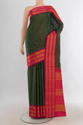 Pure Silk Mint Green Kanjivaram Saree with Plain Body and Silk Border.  displayed on a mannequin