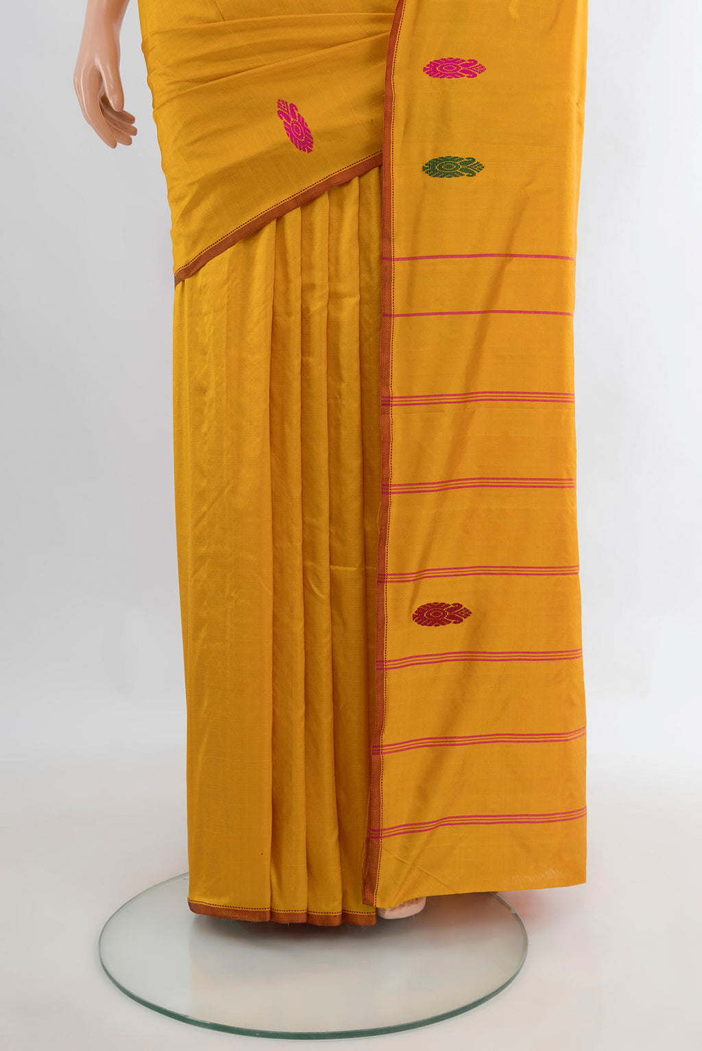 Pleats and pallu of Pure Silk Mustard Kanchipuram Saree with Plain Body and Thread Border. 