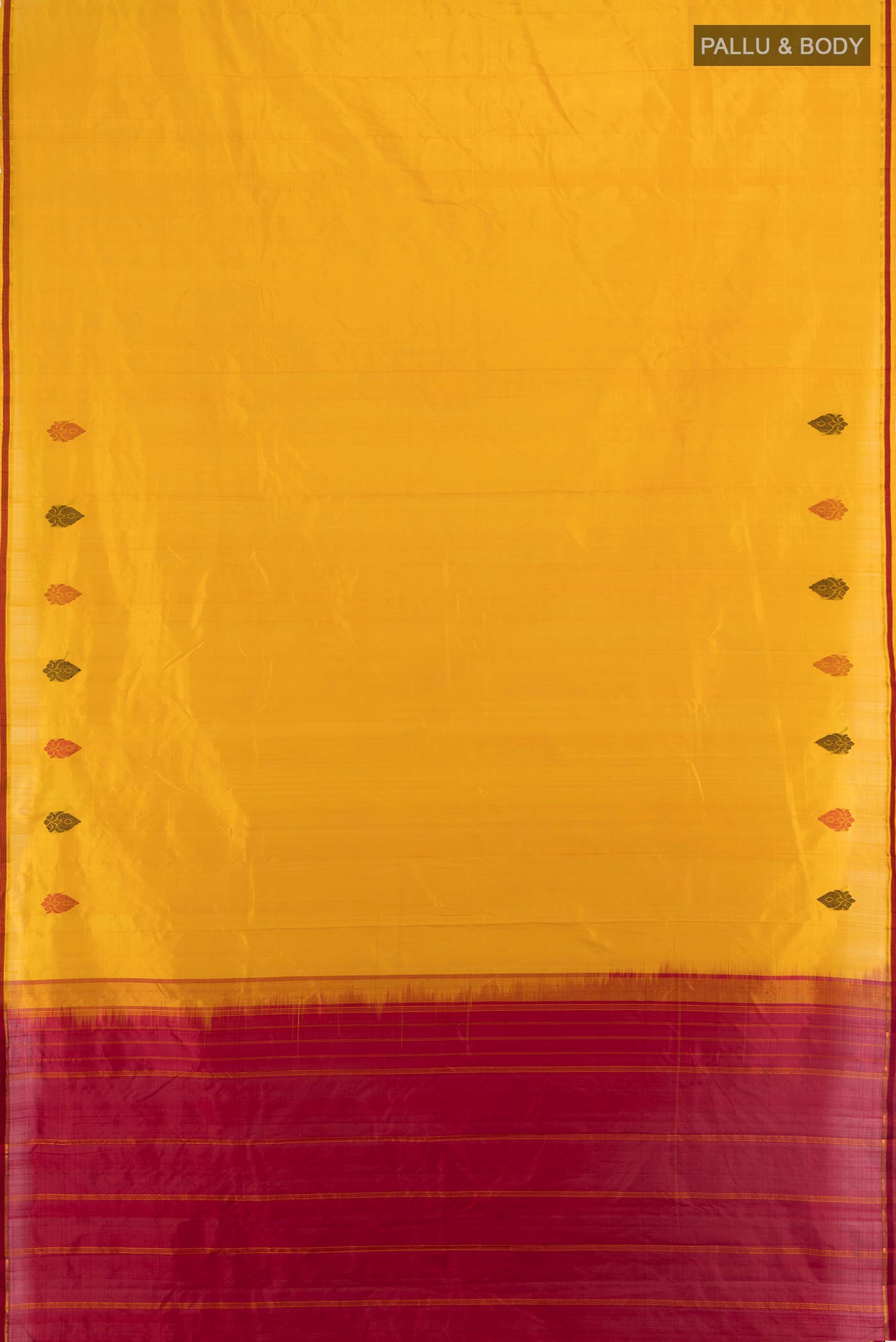 Flat view of Mustard Kanchipuram Silk Saree with Plain Body and Thread Border. 