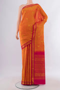 Pure Silk Mustard Kanchipuram Saree with Zari Butta on the body and Zari Border.  displayed on a mannequin