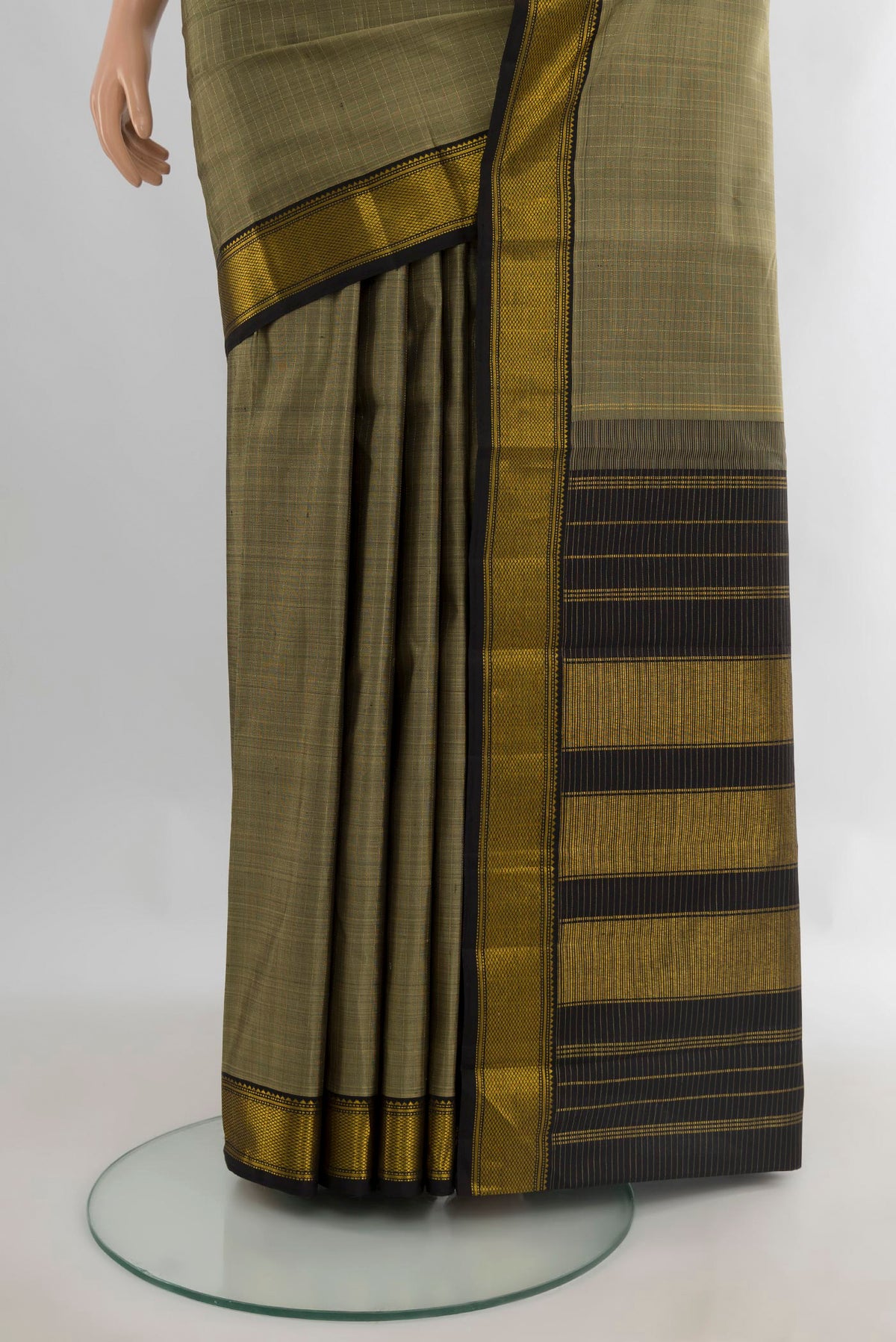 Pleats and pallu of Pure Silk Grey Kanjivaram Saree with Plain Body and Zari Border. 