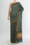 Multi Color Tussar Silk Saree with Floral Print on the body and Silk Border.  displayed on a mannequin