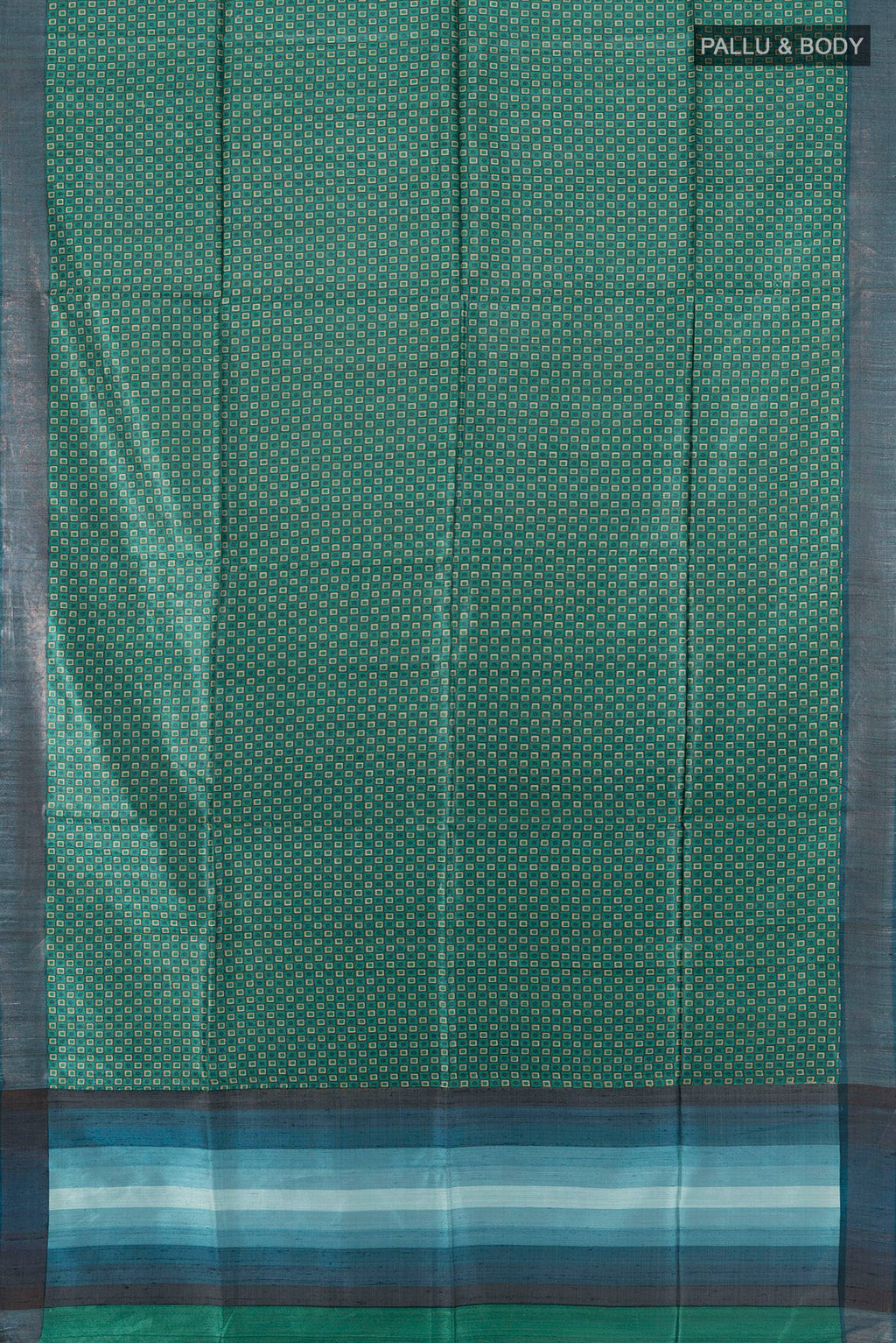 Flat view of Green Tussar Saree with Printed design on the body and Zari Border. 