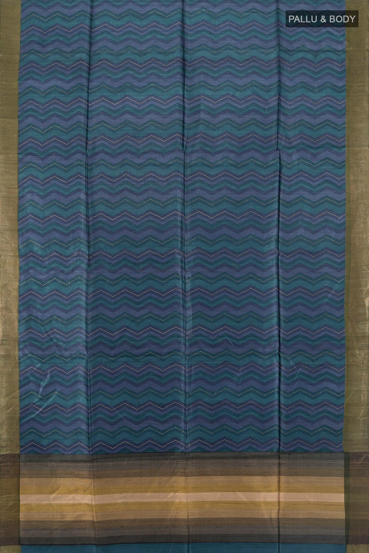 Flat view of Multi Color Tussar Saree with Printed design on the body and Zari Border. 