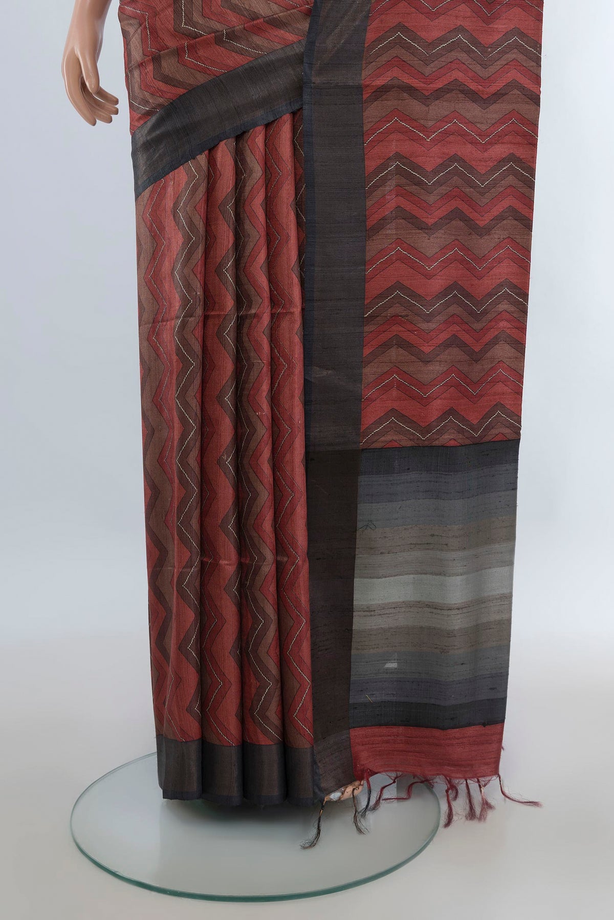 Pleats and pallu of Multi Color Tussar Saree with Floral Print on the body and Zari Border. 