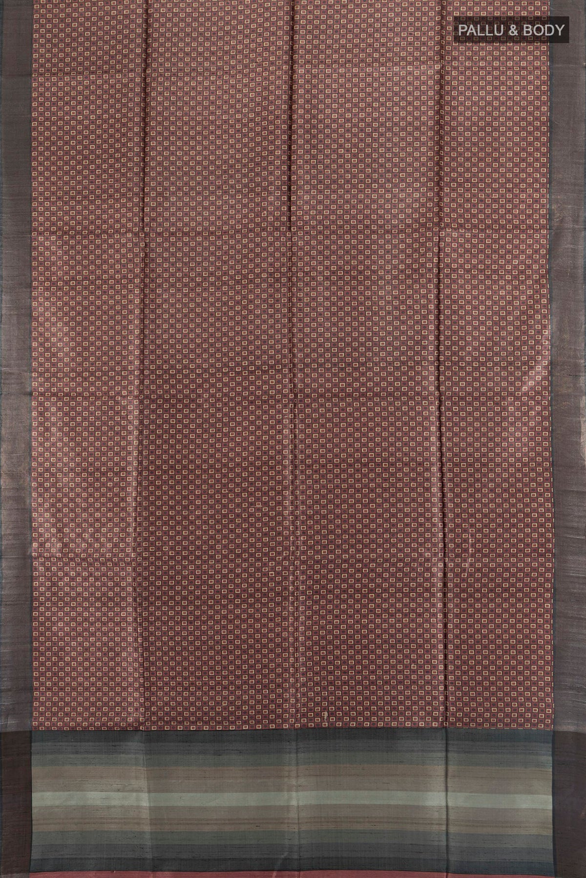 Flat view of Brown Tussar Saree with Printed design on the body and Zari Border. 