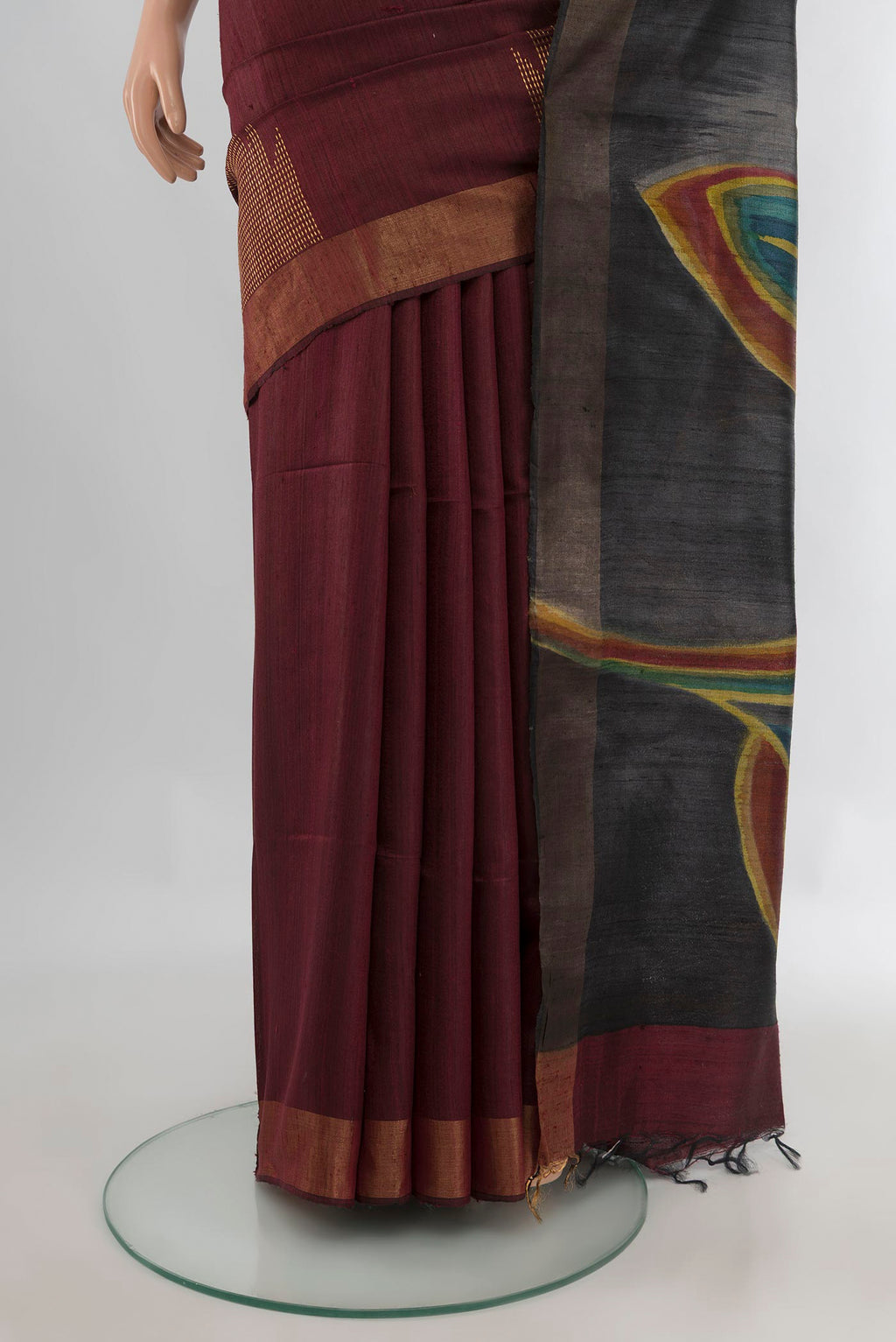 Pleats and pallu of Pure Silk Brown Tussar Saree with Plain Body and Zari Border. 