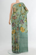 Multi Color Tussar Silk Saree with Floral Print on the body and Silk Border.  displayed on a mannequin