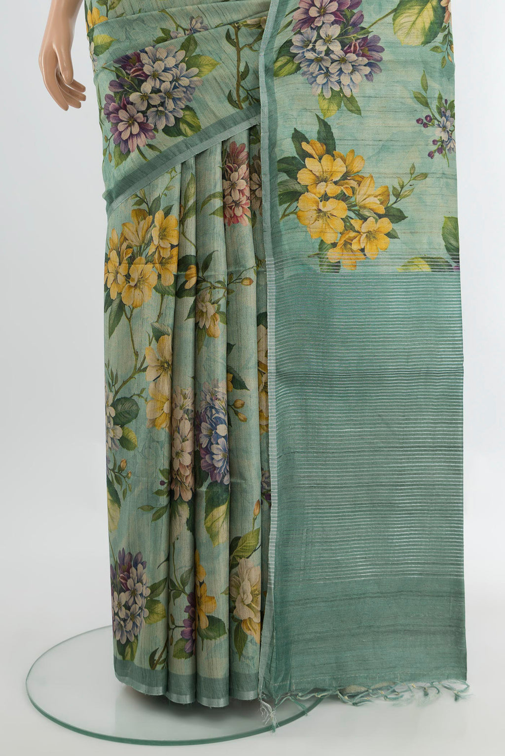 Pleats and pallu of Multi Color Tussar Silk Saree with Floral Print on the body and Silk Border. 
