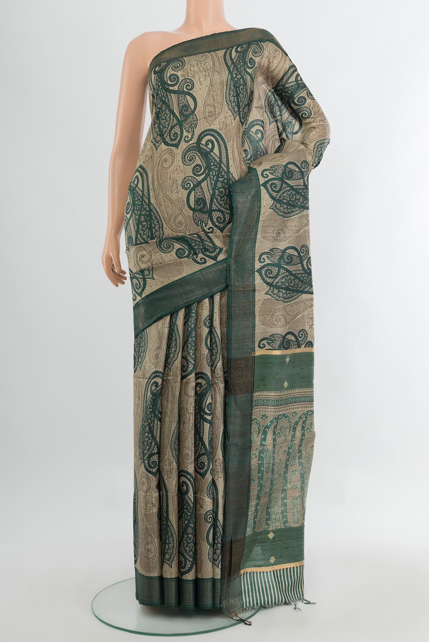 Multi Color Tussar Silk Saree with Floral Print on the body and Silk Border.  displayed on a mannequin
